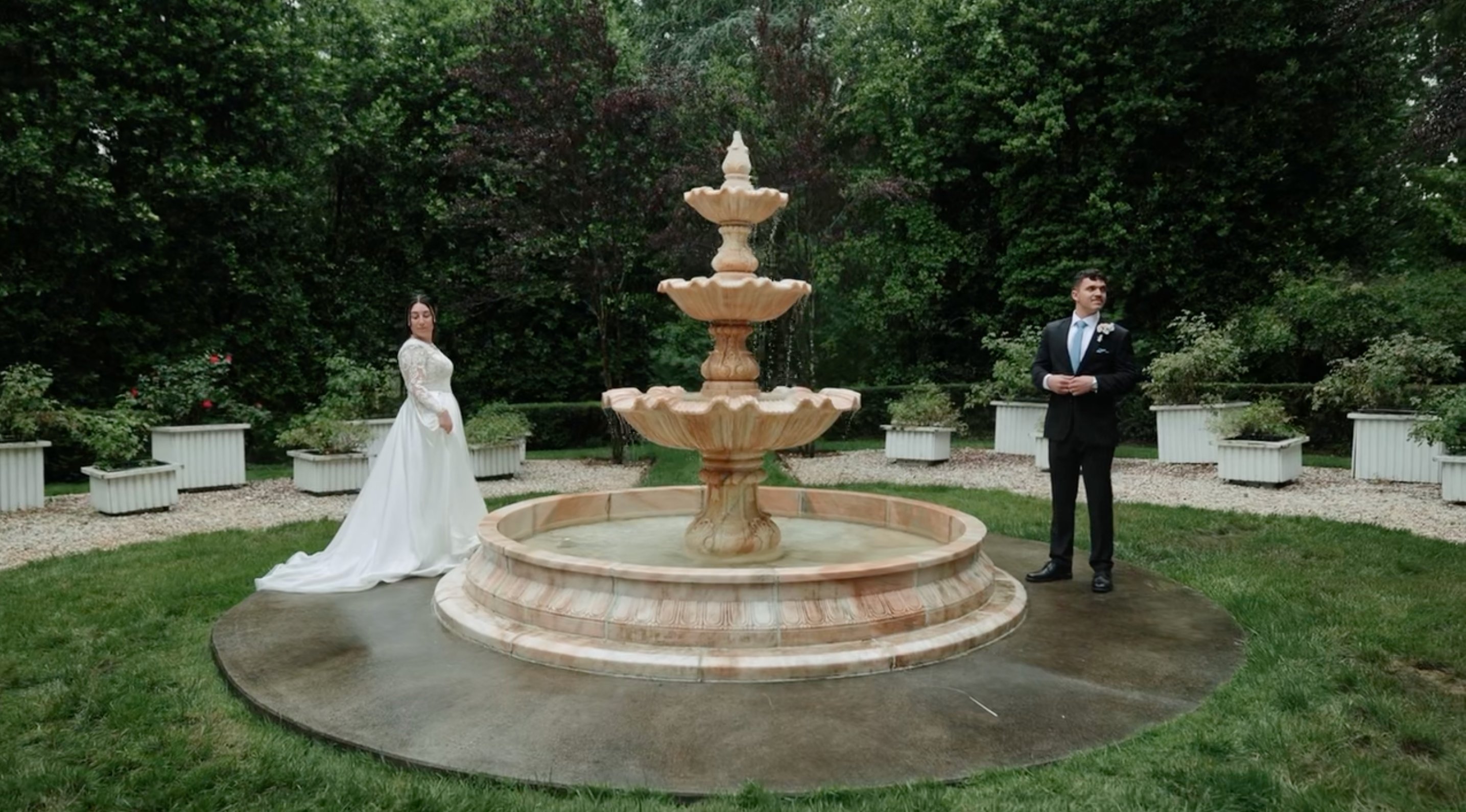 Wedding couple at fountain — Helms Productions Charlotte NC